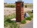 Stylish wooden mailbox with black trim and house number at 11299 E 159Th Pl, Brighton, CO 80602