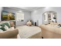 Bright living room with neutral walls, hardwood floors, and comfortable seating arrangement at 805 5Th St, Fort Lupton, CO 80621