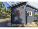 Unique exterior featuring decorative skis and stylish architecture at 20600 Rangeview Dr, Morrison, CO 80465