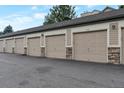 Row of individual garages with stone accents; ample parking at 8338 S Independence Cir # 108, Littleton, CO 80128