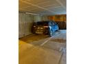 Parking spot within garage area with a black Elantra vehicle in place and clearly marked parking lines at 3025 Broadway St # 17, Boulder, CO 80304