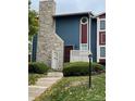Charming townhouse with stone accents, landscaped front yard, and welcoming curb appeal at 10008 Quivas St, Thornton, CO 80260