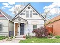 Charming home featuring a well-manicured lawn and beautiful curb appeal at 3289 Perry St, Denver, CO 80212