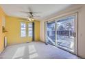 Dining area with sliding glass door to backyard at 261 S Newark Cir, Aurora, CO 80012