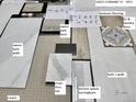 Material samples for bathrooms and kitchen showcasing tiling, flooring, and countertops at 14225 Currant St, Broomfield, CO 80020