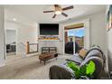 Comfortable living room with sliding glass door to a patio at 4100 Albion St # 424, Denver, CO 80216