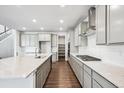 Modern kitchen featuring white countertops, stainless steel appliances, and a pantry at 2512 Lupton Ln, Lafayette, CO 80026
