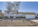 Inviting home exterior with manicured gravel yard and attractive brick accents for added curb appeal at 15510 E Bates Ave, Aurora, CO 80013