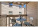 Cozy balcony seating area perfect for outdoor enjoyment at 701 Harlan St # E59, Lakewood, CO 80214