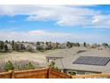 Rooftop view showcases peaceful neighborhood and stunning mountain views beyond at 89 Clara Pl, Castle Pines, CO 80108
