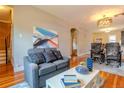 Inviting living room featuring hardwood floors and stylish decor with an open floor plan at 132 Delaware St, Denver, CO 80223