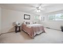 Bright bedroom with a ceiling fan and soft natural light at 6898 W Nova Dr, Littleton, CO 80128