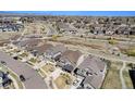 Scenic aerial view of a residential neighborhood, showcasing the well-maintained homes and landscaping at 7121 W Asbury Pl, Lakewood, CO 80227