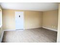 Bright and spacious living room with new flooring and a large window for ample natural light at 875 S Quebec St # 25, Denver, CO 80247