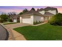 Charming single Gathering home featuring a well-manicured lawn and a two-car garage at 7309 Windsor Dr, Boulder, CO 80301