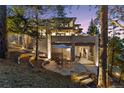 Backyard patio with stone and an outdoor table for relaxing and dining at 22419 Springflower Dr, Golden, CO 80401