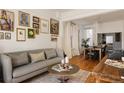Inviting living room showcasing an open layout, hardwood floors, comfortable seating, and stylish accents at 321 Fox St, Denver, CO 80223
