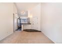 Bright living room showcases open floor plan with modern kitchen, blending style and function at 595 Manhattan Dr # 203, Boulder, CO 80303