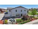 Backyard view with patio, outdoor seating area, and well-maintained landscaping at 10016 Hough Pt, Parker, CO 80134