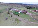 Expansive property with two houses, swimming pool, playground, and plenty of space for outdoor activities at 1063 Clarke Ct, Castle Rock, CO 80109