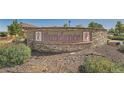 Well maintained stone community sign displays 'Sundance' surrounded by manicured landscape and beautiful greenery at 847 E 98Th Ave # 1806, Thornton, CO 80229