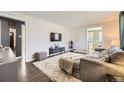 Inviting living area with a soft rug, stylish decor, and a relaxing atmosphere at 1374 S Beach Ct, Denver, CO 80219