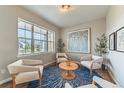 Cozy sitting room features lots of natural light, plush seating, and stylish decor at 638 W 175Th Ave, Broomfield, CO 80023