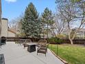 Outdoor patio with comfortable seating, perfect for entertaining and relaxation with beautiful landscaping at 1123 E 132Nd Way, Thornton, CO 80241