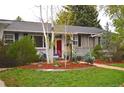 Inviting home exterior featuring a colorful front yard with cozy seating at 2261 W Briarwood Ave, Littleton, CO 80120