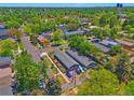 Aerial view of property in a residential neighborhood, showcasing nearby streets and green surroundings at 2955 N Gilpin St, Denver, CO 80205