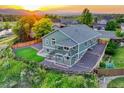 Aerial view of a two-story home featuring a spacious, fenced backyard at 1838 Mountain Daisy Ct, Highlands Ranch, CO 80129