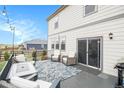 Relaxing back deck with outdoor seating with easy access to backyard at 8395 E 132Nd Pl, Thornton, CO 80602