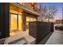 Inviting home entrance with a glass door, showcasing a dining area at 33 S Ogden St, Denver, CO 80209