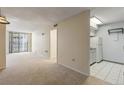 Spacious living room seamlessly connects to the kitchen, creating an open and inviting atmosphere at 1020 15Th St # 25D, Denver, CO 80202