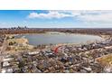 Stunning aerial view of the property near a lake, showcasing its prime location and neighborhood at 2432 Ames St, Edgewater, CO 80214