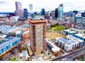 Stunning aerial view of the Denver skyline showcasing the property's prime location near downtown at 100 Park W Ave # 1606, Denver, CO 80205