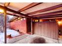 Covered carport entrance to mid-century home at 5420 Manitou Rd, Littleton, CO 80123