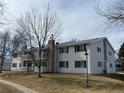 Side view of a condo building showcasing its design at 14453 E Jewell Ave # 104, Aurora, CO 80012