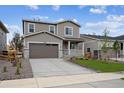 Charming two-story home features a well-manicured lawn and welcoming front porch, perfect for enjoying the outdoors at 24737 E 40Th Ave, Aurora, CO 80019