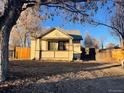 Charming home featuring a welcoming front porch and a well-maintained yard in a quiet neighborhood at 2771 W 1St Ave, Denver, CO 80219