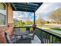 Inviting front porch with outdoor seating, perfect for enjoying a relaxing view of the neighborhood at 237 Dayton St, Denver, CO 80230