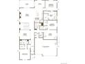 Detailed floor plan showcasing the layout of the home's first floor, including the kitchen, bedrooms, and living spaces at 4722 Twelve Oaks Way, Castle Rock, CO 80104