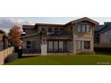 Back exterior showcasing a deck, balcony, and backyard at 1020 24Th St, Golden, CO 80401