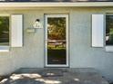 Welcoming front entrance showing the house number and glass door with white trim at 1941 S Dexter St, Denver, CO 80222
