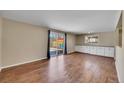 Bright dining area with hardwood floors and built-in cabinetry at 7505 Clay St, Westminster, CO 80030