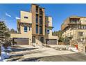 Stunning modern home featuring clean lines, balconies, and two garages, perfect for stylish living at 28665 Tepees Way, Evergreen, CO 80439