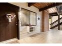 Inviting entryway with a decorative wreath on the door and a window for natural light at 14806 E 2Nd Ave # 104G, Aurora, CO 80011