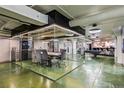 Bright conference room with a glass enclosure, table, and chairs, ideal for meetings at 2000 Arapahoe St # 1, Denver, CO 80205