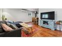 Cozy living room with hardwood floors and stylish decor at 1343 Gay St, Longmont, CO 80501