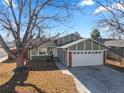 Charming two-story home with attached garage and well-maintained front yard in a quiet neighborhood at 3606 S Olathe Way, Aurora, CO 80013